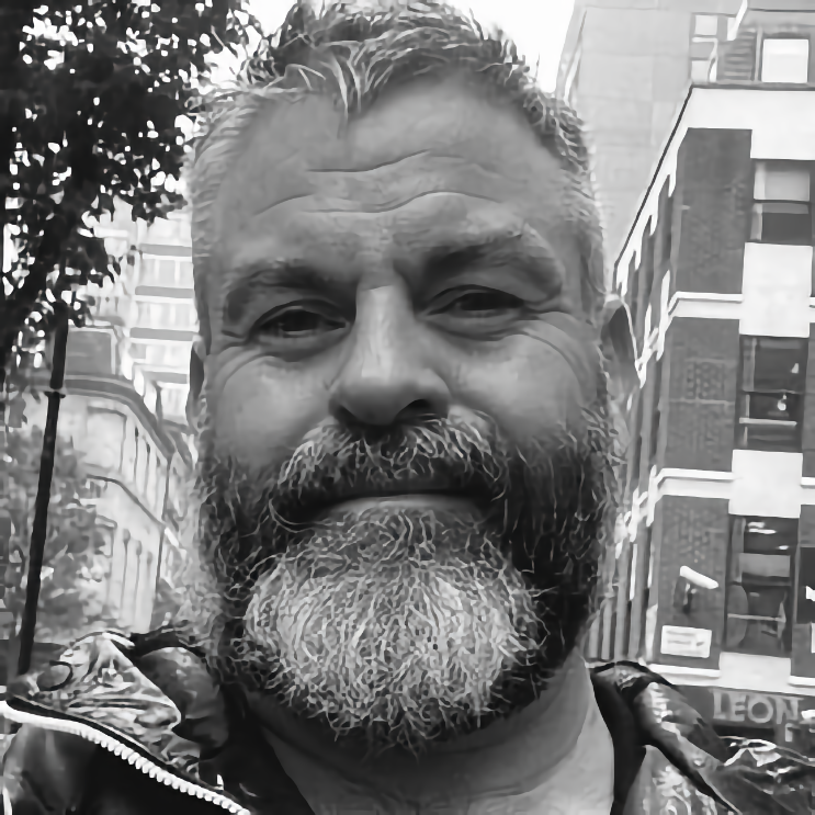Close-up black and white portrait of Shaun Watson
