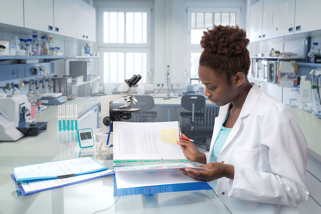 African scientist, medical worker or tech in modern laboratory